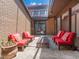 Charming outdoor courtyard with comfortable seating and a skylight, perfect for relaxation at 7 Sandy Cove Rd, Sarasota, FL 34242