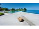 Scenic dock with a bench overlooking serene waterfront views at 7 Sandy Cove Rd, Sarasota, FL 34242