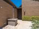 Inviting front entrance with a contemporary design, brick exterior, and well-maintained landscaping at 7 Sandy Cove Rd, Sarasota, FL 34242