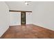 Spacious living room featuring tile flooring and a window with natural light at 7 Sandy Cove Rd, Sarasota, FL 34242