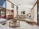 Bright and airy living room with modern furniture, high ceilings, and natural light at 7 Sandy Cove Rd, Sarasota, FL 34242