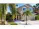 Inviting front yard with a charming bench seating area and a well-maintained walkway leading to the entrance at 7168 Chatum Light Run, Bradenton, FL 34212