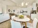 Open concept living space seamlessly integrating living room, dining, and kitchen areas at 7425 Divot Loop, Lakewood Ranch, FL 34202