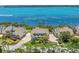 Beautiful waterfront homes with manicured lawns and serene water views at 78 Tidy Island Blvd, Bradenton, FL 34210