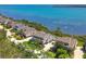 Waterfront homes with lush landscaping and stunning views of the bay at 78 Tidy Island Blvd, Bradenton, FL 34210