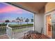 Relaxing balcony with seating overlooking the water and lush greenery at 78 Tidy Island Blvd, Bradenton, FL 34210