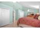 Spacious bedroom features closets, fan, a large bed, and plenty of natural light at 78 Tidy Island Blvd, Bradenton, FL 34210