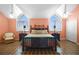 Comfortable bedroom boasts a large window, ceiling fan, and spacious layout at 78 Tidy Island Blvd, Bradenton, FL 34210