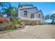 Spacious waterfront home with a large driveway and well-maintained landscaping at 78 Tidy Island Blvd, Bradenton, FL 34210