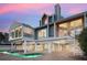 Beautiful elevated waterfront home with a pool, patio and spectacular sunset views at 78 Tidy Island Blvd, Bradenton, FL 34210