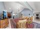 Bright living room showcasing a vaulted ceiling, red rug, and elegant furnishings at 78 Tidy Island Blvd, Bradenton, FL 34210