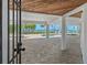 Large patio with ocean view and columns by the pool, perfect for entertaining at 78 Tidy Island Blvd, Bradenton, FL 34210