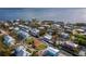 Beautiful aerial of the home situated on the water with breathtaking views of the bay at 780 Jungle Queen Way, Longboat Key, FL 34228