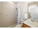 Bathroom features a vanity, toilet, and walk-in shower at 7804 Edmonston Cir, University Park, FL 34201