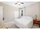 Simple bedroom with a bed, carpet, and a small desk at 7804 Edmonston Cir, University Park, FL 34201