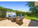 Charming outdoor patio with comfortable seating, perfect for relaxing or entertaining guests at 7804 Edmonston Cir, University Park, FL 34201