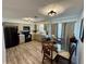 Modern kitchen and dining area boasting updated appliances, sleek countertops, and ample cabinet space at 807 Mohawk Rd, Venice, FL 34293