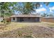 Expansive backyard featuring a screened lanai perfect for outdoor entertaining and relaxation at 920 36Th W St, Bradenton, FL 34205