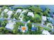 Aerial shot showcasing home, landscaping, and neighborhood at 104 Shoreland Dr, Osprey, FL 34229