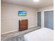 A neutral bedroom offers a dresser and closet at 104 Shoreland Dr, Osprey, FL 34229