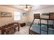 A ' bedroom with bunk beds and a foosball table at 104 Shoreland Dr, Osprey, FL 34229