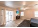 A bedroom with hardwood floors, dresser, and a balcony view at 104 Shoreland Dr, Osprey, FL 34229