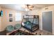 A ' bedroom with bunk beds and a foosball table at 104 Shoreland Dr, Osprey, FL 34229