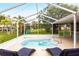 Beautiful screened-in pool area with backyard view at 104 Shoreland Dr, Osprey, FL 34229