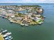 Waterfront home featuring a pool and boat dock with Gulf access at 10432 Sandpiper W Rd, Bradenton, FL 34209