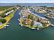 Waterfront home featuring a pool and boat dock with Gulf access at 10432 Sandpiper W Rd, Bradenton, FL 34209