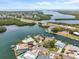 Waterfront home on a peninsula surrounded by lush landscaping and Gulf access at 10432 Sandpiper W Rd, Bradenton, FL 34209