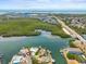 Waterfront home featuring lush surroundings and boating access to the Gulf of Mexico at 10432 Sandpiper W Rd, Bradenton, FL 34209