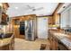 Spacious kitchen area featuring stainless steel appliances and granite countertops at 10432 Sandpiper W Rd, Bradenton, FL 34209