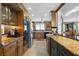 Spacious kitchen featuring granite countertops, stainless steel appliances, and stylish cabinetry at 10432 Sandpiper W Rd, Bradenton, FL 34209