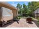 Brick-paved backyard with lush landscaping and barbecue area, great for entertaining at 1052 32Nd St, Sarasota, FL 34234