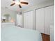 Bedroom featuring hardwood floors, a large closet and view of the yard at 1052 32Nd St, Sarasota, FL 34234