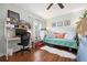 Bedroom/Office featuring hardwood floors, day bed and desk at 1052 32Nd St, Sarasota, FL 34234