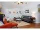 Spacious living room with vaulted ceilings, hardwood floors, and comfortable seating arrangement at 1052 32Nd St, Sarasota, FL 34234