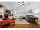 Cozy living room with vaulted ceilings, hardwood floors, TV, and stylish decor at 1052 32Nd St, Sarasota, FL 34234