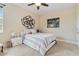 Comfortable bedroom with stylish geometric wall art and neutral toned decor at 1109 Riverscape St, Bradenton, FL 34208