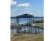 Community boat lift overlooking the river and lush landscaping at 1109 Riverscape St, Bradenton, FL 34208