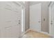 Bright foyer featuring tile flooring, and a view to the elevator at 1109 Riverscape St, Bradenton, FL 34208