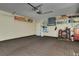 Well-lit garage offers ample space for vehicles and storage, featuring a brick floor at 1109 Riverscape St, Bradenton, FL 34208