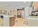 Spacious kitchen featuring granite countertops, stainless steel appliances, and wood cabinetry at 1109 Riverscape St, Bradenton, FL 34208