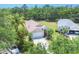 Lovely home with mature trees, well-maintained yard, and a welcoming front entrance at 11236 Beebalm Cir, Lakewood Ranch, FL 34202