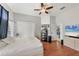 Bedroom with wood floors, closet space, and plenty of natural light at 11236 Beebalm Cir, Lakewood Ranch, FL 34202