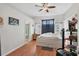 Bright bedroom with hardwood floors and ensuite bathroom access at 11236 Beebalm Cir, Lakewood Ranch, FL 34202