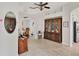 Hallway view showcasing hardwood floors, neutral walls, and views to dining and other rooms at 11236 Beebalm Cir, Lakewood Ranch, FL 34202