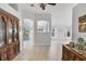 Hallway view showcasing hardwood floors, neutral walls, and views to other rooms at 11236 Beebalm Cir, Lakewood Ranch, FL 34202