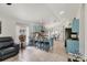 Open concept kitchen with breakfast bar and modern blue cabinets at 11236 Beebalm Cir, Lakewood Ranch, FL 34202